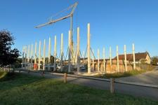 Rochefort sur Nenon : construction d'un gymnase de 800 m² comprenant : 26 poteaux béton de 10 m de haut, murs béton et prémur (512 m²), dalle pleine (240 m²) et briques monomur de 30 cm (710 m²)